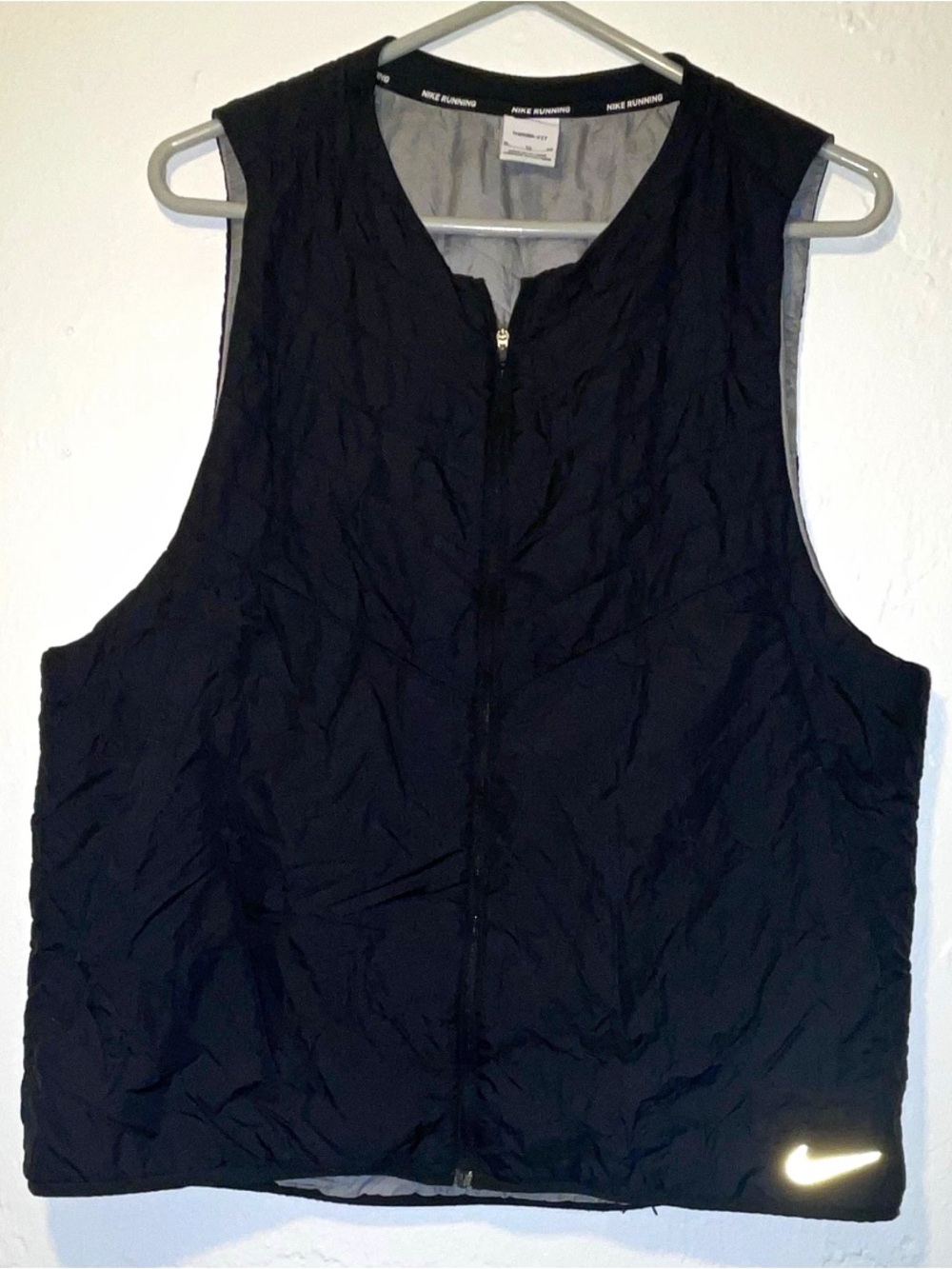 Nike men’s Black Quilted Sleeveless Zip Vest with Reflective Swoosh